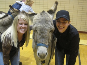 Nikki and Connor with the Donkey at Donkey Basketball